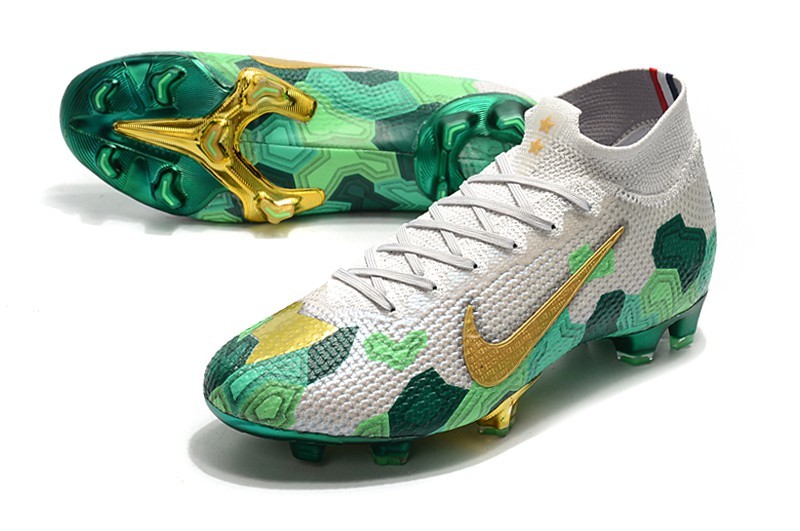 green and gold nike football cleats