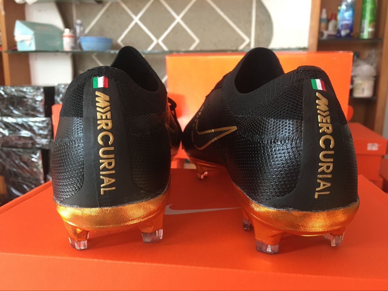 nike mercurial flyknit black and gold